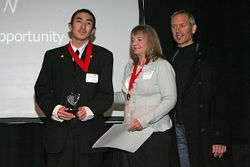 Volunteer of the Year winners Vincent Chew and Jean Taylor with sponsor Woodlands Market owner Don Santa